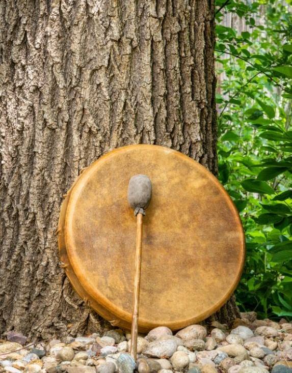 Shamanic Frame Drum leaning against a tree