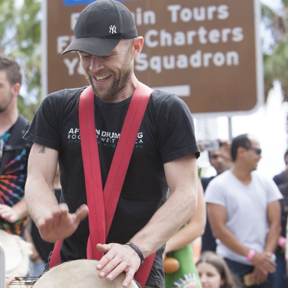 Dave Hicly, African drumming teacher, leading a workshop with djembe
