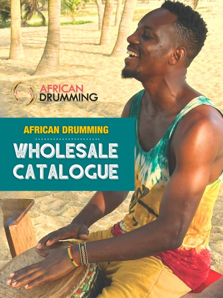 African Drumming Wholesale Catalogue – musician playing djembe on the beach