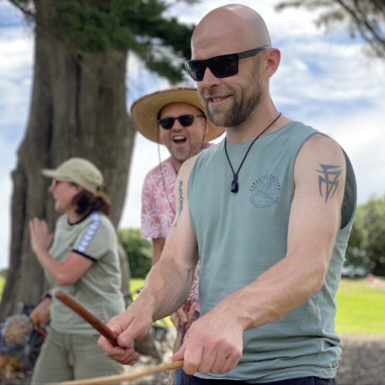 Students collaborating in African Drumming outdoor djembe performance