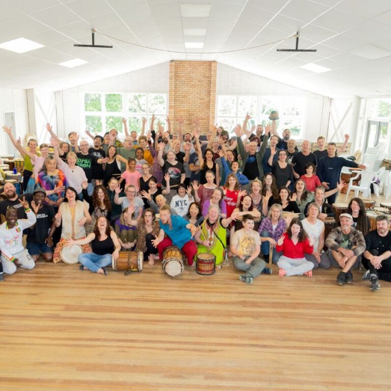 Group photo of all participants and facilitators at the NZ Drum & Dance Camp.