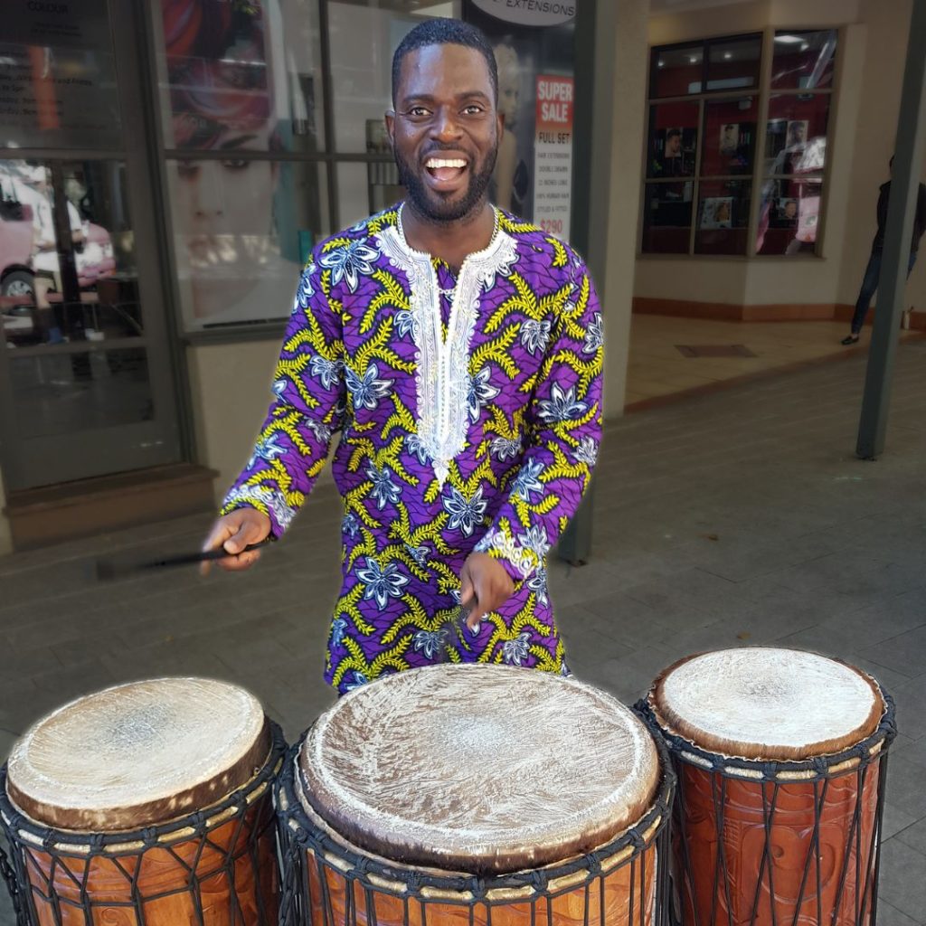 Street festival with African dun duns