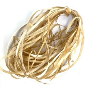 Coiled bundle of rawhide shamanic drum lacing, medium thickness strap