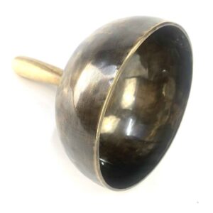 Handmade Himalayan singing bowl with handle for meditation and sound healing